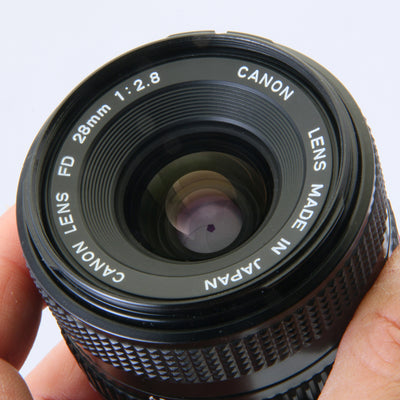 16.Canon NEW FD 28mm F2.8 Prime Lens for EOS Serial number 624521